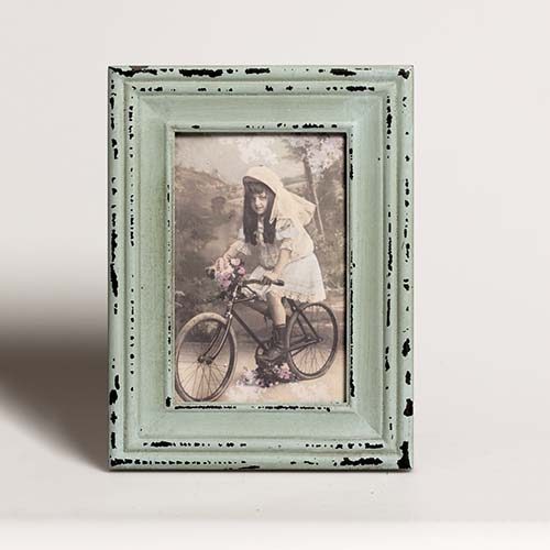 Vintage shabby chic photo frame in sage green for funeral or memorial